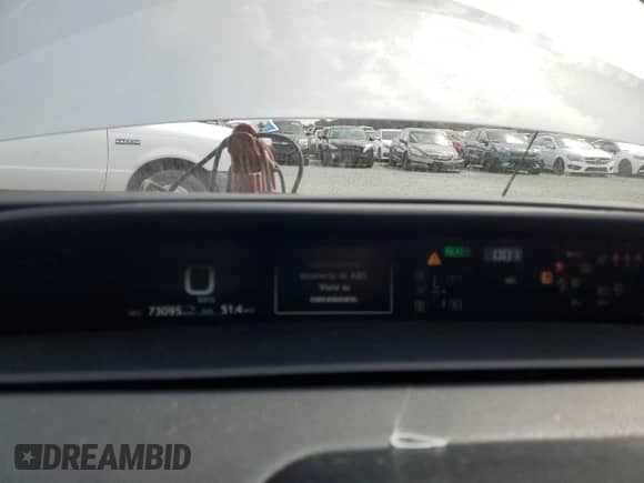 2021 Toyota Prius L Eco with VIN JTDKAMFU0M3141002, listed as a Copart auction lot 84425805 with 73,095 mi miles and Clean title. Bid and sale history available at DreamBid. Image 9.