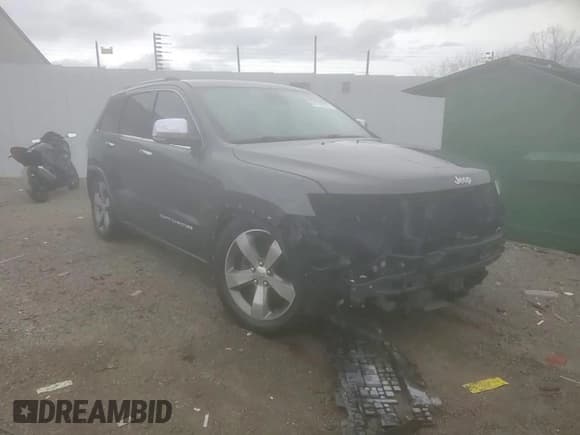 ✅ 2015 Jeep Grand Cherokee Overland • VIN: 1C4RJFCM4FC852509 • Lot: 84470024. Listed on Copart with 139,378 mi. Free auction sales archive from the USA and detailed vehicle history report at DreamBid. Image 15.