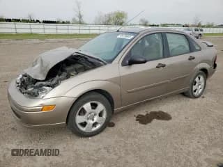 ✅ 2003 Ford Focus SE • VIN: 1FAFP34323W132583 • Lot: 49728845. Listed on Copart with Not provided. Free auction sales archive from the USA and detailed vehicle history report at DreamBid. Image 1.