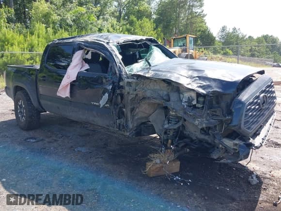 ✅ 2023 Toyota Tacoma SR • VIN: 3TMCZ5AN8PM600119 • Лот: 42605659. Опубликован ранее на IAAI с пробегом 65 838 миль. Бесплатный доступ к архиву аукционных продаж из США и подробный отчёт об истории автомобиля на DreamBid. Изображение 1.