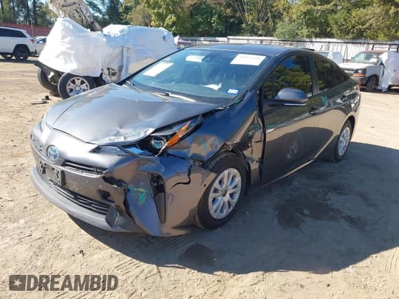 ✅ 2022 Toyota Prius L Eco • VIN: JTDKAMFU3N3189384 • Lot: 43575250. Listed on IAAI with 155,443 mi. Free auction sales archive from the USA and detailed vehicle history report at DreamBid. Image 2.