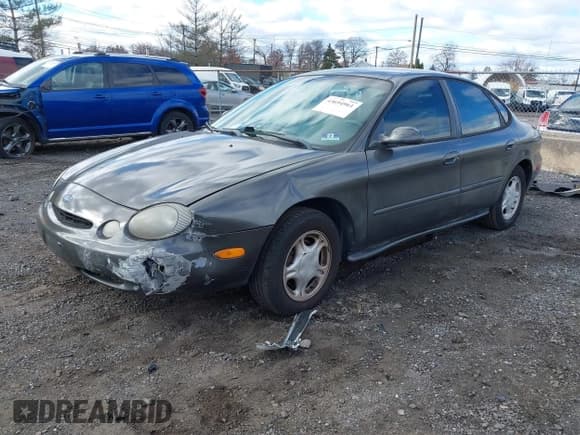 ✅ 1996 Ford Taurus GL • VIN: 1FALP52U9TA199317 • Lot: 43694961. Wystawiony na IAAI z przebiegiem 99 130 mil. Bezpłatny archiwum sprzedaży aukcyjnych z USA i szczegółowy raport historii pojazdu na DreamBid. Zdjęcie 2.