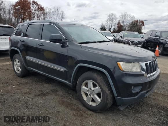 ✅ 2011 Jeep Grand Cherokee Laredo • VIN: 1J4RR4GG4BC582008 • Lot: 92726845. Listed on Copart with 222,021 mi. Free auction sales archive from the USA and detailed vehicle history report at DreamBid. Image 4.