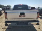 ✅ 2018 GMC Sierra 1500 SLT • VIN: 3GTU2NEC6JG602040 • Лот: 61049375. Опубликован ранее на Copart с пробегом 144 091 миль. Бесплатный доступ к архиву аукционных продаж из США и подробный отчёт об истории автомобиля на DreamBid. Изображение 6.