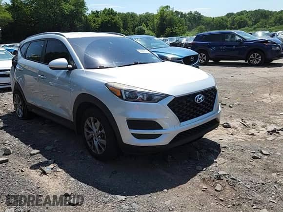 2019 Hyundai Tucson Value with VIN KM8J3CA47KU014032, listed as a Copart auction lot 63592985 with 62,040 mi miles and Salvage title. Bid and sale history available at DreamBid. Image 14.