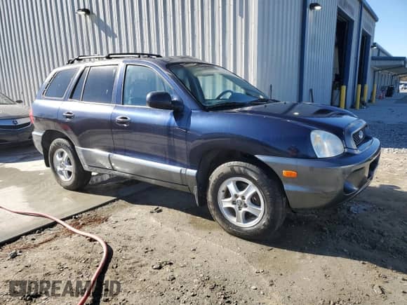 2004 Hyundai Santa Fe GLS z VIN KM8SC73D44U850523, wystawiony jako Copart lot #87738135 z przebiegiem 119 385 mil mil oraz Szkoda całkowita • Salvage title. Historia ofert i sprzedaży dostępna na DreamBid. Obrazek 4.