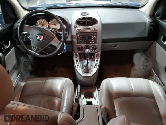 2004 Saturn VUE V6 z VIN 5GZCZ63494S838346, wystawiony jako Copart lot #76009294 z przebiegiem 196 035 mil mil oraz Szkoda całkowita • Salvage title. Historia ofert i sprzedaży dostępna na DreamBid. Obrazek 8.