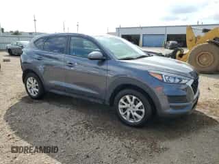 ✅ 2019 Hyundai Tucson SE • VIN: KM8J2CA41KU062533 • Лот: 84286685. Размещён на Copart с пробегом 52 337 миль миль. Получите бесплатный доступ к архиву аукционных продаж из США и посмотрите подробный отчёт об истории автомобиля на DreamBid. Изображение 4.