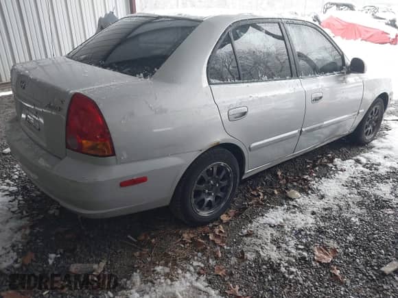 2005 Hyundai Accent GLS with VIN KMHCG45C75U656548, listed as a IAAI auction lot 41553603 with 178,070 mi miles and . Bid and sale history available at DreamBid. Image 4.
