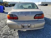 ✅ 2000 Chevrolet Malibu LS • VIN: 1G1NE52J3Y6259027 • Lot: 84865335. Listed on Copart with 87,728 mi. Free auction sales archive from the USA and detailed vehicle history report at DreamBid. Image 6.