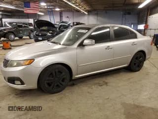 ✅ 2009 Kia Optima SX • VIN: KNAGE224795333403 • Lot: 89347725. Wystawiony na Copart z przebiegiem 130 337 mil. Bezpłatny archiwum sprzedaży aukcyjnych z USA i szczegółowy raport historii pojazdu na DreamBid. Zdjęcie 1.