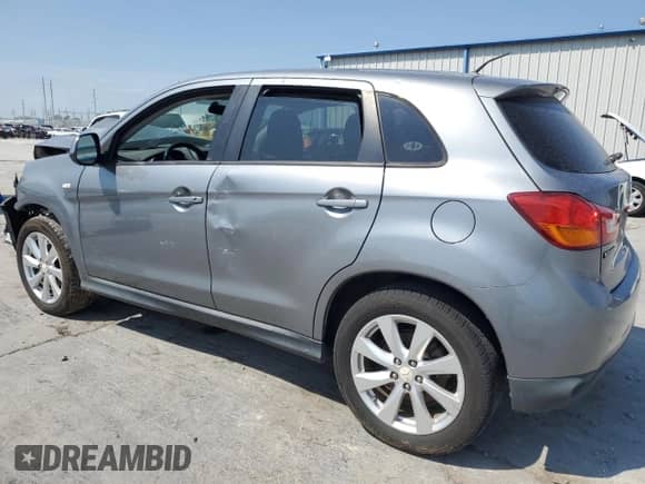 2015 Mitsubishi Outlander ES with VIN 4A4AP3AU2FE022752, listed as a Copart auction lot 71730925 with 212,695 mi miles and Salvage title. Bid and sale history available at DreamBid. Image 2.