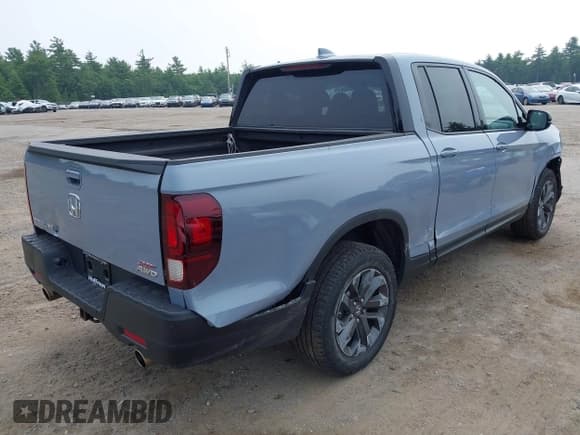 ✅ 2023 Honda Ridgeline Sport • VIN: 5FPYK3F1XPB046615 • Lot: 42893712. Listed on IAAI with 20,719 mi. Free auction sales archive from the USA and detailed vehicle history report at DreamBid. Image 4.