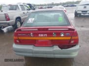 ✅ 1995 Ford Escort • VIN: 1FASP11J5SW107553 • Lot: 42202877. Listed on IAAI with 76,751 mi. Free auction sales archive from the USA and detailed vehicle history report at DreamBid. Image 16.