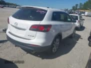 ✅ 2013 Mazda CX-9 Grand Touring • VIN: JM3TB2DA6D0424463 • Lot: 43422400. Wystawiony na IAAI z przebiegiem 123 157 mil. Bezpłatny archiwum sprzedaży aukcyjnych z USA i szczegółowy raport historii pojazdu na DreamBid. Zdjęcie 4.