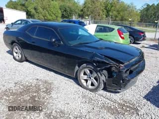 2013 Dodge Challenger SXT with VIN 2C3CDYAG2DH596472, listed as a IAAI auction lot 43552887 with 222,700 mi miles and . Bid and sale history available at DreamBid. Image 1.