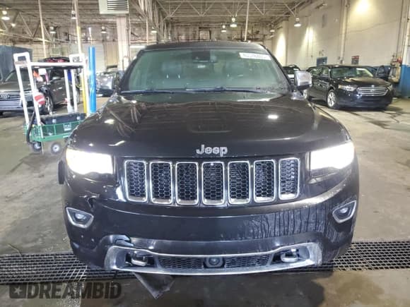 ✅ 2015 Jeep Grand Cherokee Overland • VIN: 1C4RJFCG8FC732562 • Lot: 46518865. Listed on Copart with 70,875 mi. Free auction sales archive from the USA and detailed vehicle history report at DreamBid. Image 5.