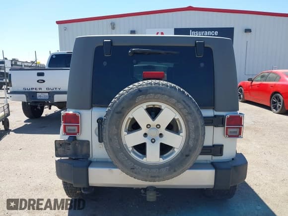 ✅ 2010 Jeep Wrangler Unlimited Sahara • VIN: 1J4HA5H19AL215395 • Лот: 43199080. Опубликован ранее на IAAI с пробегом 206 729 миль. Бесплатный доступ к архиву аукционных продаж из США и подробный отчёт об истории автомобиля на DreamBid. Изображение 16.