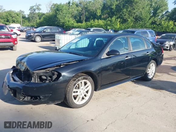 ✅ 2014 Chevrolet Impala LTZ • VIN: 2G1WC5E34E1121782 • Lot: 42543786. Listed on IAAI with 111,767 mi. Free auction sales archive from the USA and detailed vehicle history report at DreamBid. Image 18.