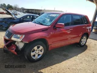 ✅ 2012 Suzuki Grand Vitara Premium • VIN: JS3TE0D62C4100130 • Lot: 48662145. Listed on Copart with 81,557 mi. Free auction sales archive from the USA and detailed vehicle history report at DreamBid. Image 1.