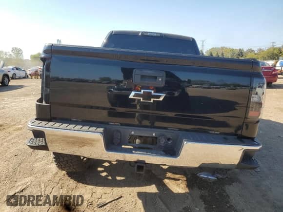 2015 Chevrolet Silverado 1500 LT with VIN 3GCUKREC1FG418428, listed as a Copart auction lot 84203845 with 116,745 mi miles and Salvage title. Bid and sale history available at DreamBid. Image 6.