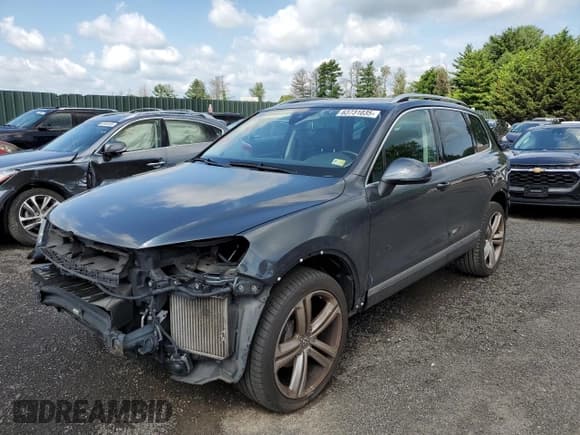 ✅ 2016 Volkswagen Touareg Sport • VIN: WVGEP9BP9GD005227 • Lot: 63731035. Listed on Copart with Not provided. Free auction sales archive from the USA and detailed vehicle history report at DreamBid. Image 1.