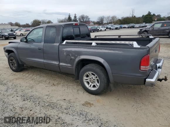 ✅ 2004 Dodge Dakota SLT • VIN: 1D7GL42N34S717286 • Lot: 81179604. Listed on Copart with 166,893 mi. Free auction sales archive from the USA and detailed vehicle history report at DreamBid. Image 2.