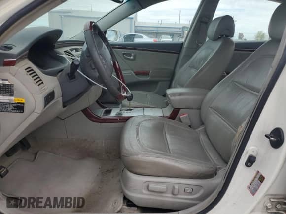 2006 Hyundai Azera SE с VIN KMHFC46F26A046383, выставлен на аукционе Copart как лот 47971535 с пробегом 306 323 миль миль и Списание • Salvage title. История ставок и продаж доступна на DreamBid. Изображение 7.