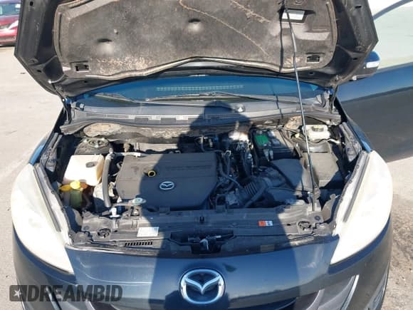 ✅ 2013 Mazda 5 Touring • VIN: JM1CW2CL9D0150904 • Lot: 42017508. Listed on IAAI with 165,192 mi. Free auction sales archive from the USA and detailed vehicle history report at DreamBid. Image 10.