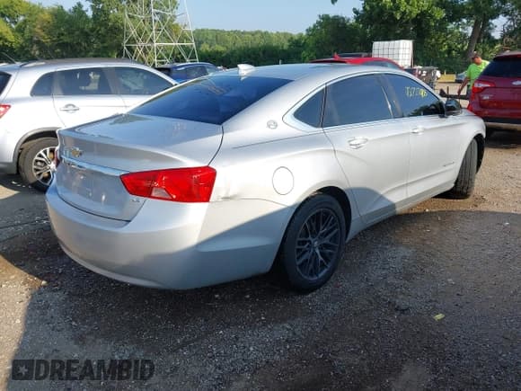 ✅ 2015 Chevrolet Impala LS • VIN: 2G11X5SL6F9135009 • Lot: 42727418. Listed on IAAI with 140,164 mi. Free auction sales archive from the USA and detailed vehicle history report at DreamBid. Image 4.