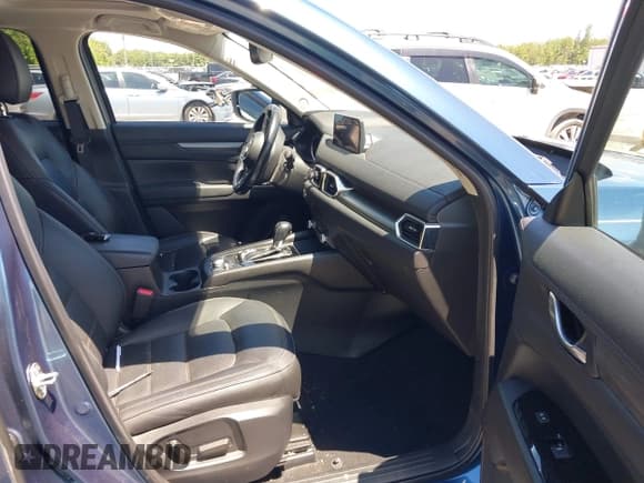 ✅ 2022 Mazda CX-5 S Carbon Edition • VIN: JM3KFBCM5N0620116 • Lot: 43033082. Listed on IAAI with 48,059 mi. Free auction sales archive from the USA and detailed vehicle history report at DreamBid. Image 5.