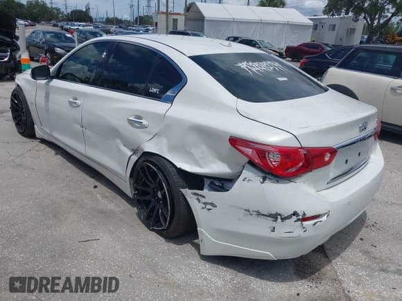 ✅ 2014 Infiniti Q50 Premium • VIN: JN1BV7APXEM674609 • Лот: 42501051. Опубликован ранее на IAAI с пробегом 93 998 миль. Бесплатный доступ к архиву аукционных продаж из США и подробный отчёт об истории автомобиля на DreamBid. Изображение 3.