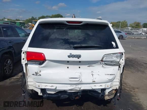 2018 Jeep Grand Cherokee Altitude z VIN 1C4RJFAGXJC504400, wystawiony jako IAAI lot #43318140 z przebiegiem 100 572 mil mil oraz . Historia ofert i sprzedaży dostępna na DreamBid. Obrazek 17.