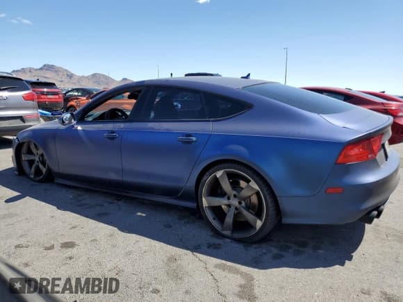 ✅ 2015 Audi S7 • VIN: WAUW2AFCXFN032765 • Lot: 56916125. Listed on Copart with 91,610 mi. Free auction sales archive from the USA and detailed vehicle history report at DreamBid. Image 2.