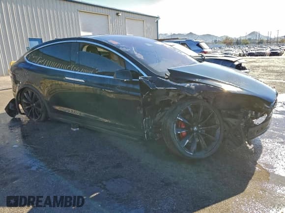 ✅ 2017 Tesla Model X P100D • VIN: 5YJXCBE44HF051687 • Lot: 94792735. Wystawiony na Copart z przebiegiem 131 314 mil. Bezpłatny archiwum sprzedaży aukcyjnych z USA i szczegółowy raport historii pojazdu na DreamBid. Zdjęcie 4.