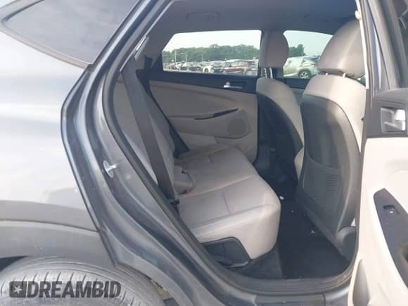 2019 Hyundai Tucson SE with VIN KM8J23A40KU009435, listed as a IAAI auction lot 42847449 with 94,053 mi miles and . Bid and sale history available at DreamBid. Image 8.