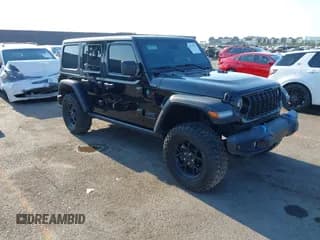 ✅ 2024 Jeep Wrangler Willys • VIN: 1C4RJXN60RW342696 • Lot: 42933521. Listed on IAAI with 11,889 mi. Free auction sales archive from the USA and detailed vehicle history report at DreamBid. Image 1.