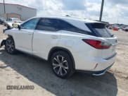 ✅ 2018 Lexus RX 350L Premium • VIN: JTJGZKCA8J2003767 • Лот: 42299417. Опубликован ранее на IAAI с пробегом 82 133 миль. Бесплатный доступ к архиву аукционных продаж из США и подробный отчёт об истории автомобиля на DreamBid. Изображение 3.