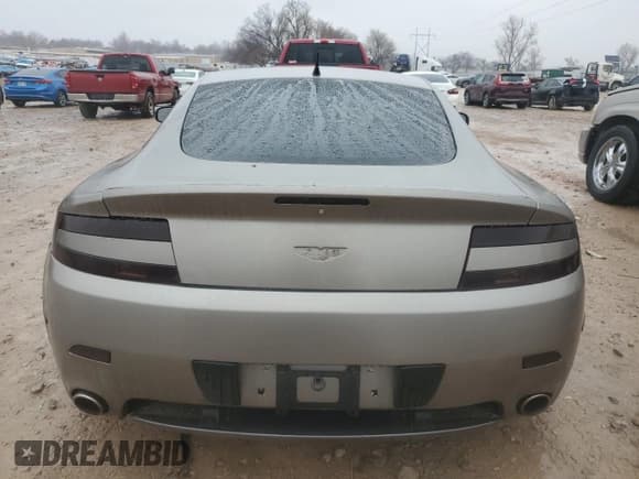 ✅ 2006 Aston Martin Vantage • VIN: SCFBB03BX6GC02042 • Лот: 42527075. Опубликован ранее на Copart с пробегом 61 538 миль. Бесплатный доступ к архиву аукционных продаж из США и подробный отчёт об истории автомобиля на DreamBid. Изображение 6.