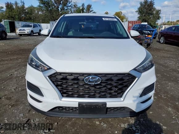 2019 Hyundai Tucson SE z VIN KM8J23A45KU869928, wystawiony jako Copart lot #87183485 z przebiegiem 42 648 mil mil oraz Szkoda całkowita • Salvage title. Historia ofert i sprzedaży dostępna na DreamBid. Obrazek 5.