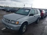 ✅ 2001 Isuzu Rodeo S • VIN: 4S2DM58WX14352481 • Lot: 42152621. Listed on IAAI with 162,696 mi. Free auction sales archive from the USA and detailed vehicle history report at DreamBid. Image 2.