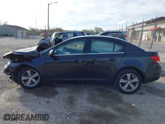2014 Chevrolet Cruze 2LT with VIN 1G1PE5SB8E7367893, listed as a IAAI auction lot 43560413 with 148,407 mi miles and . Bid and sale history available at DreamBid. Image 14.