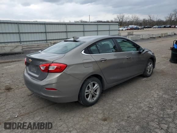 ✅ 2018 Chevrolet Cruze LT • VIN: 1G1BE5SMXJ7189734 • Lot: 46868703. Listed on Copart with 60,174 mi. Free auction sales archive from the USA and detailed vehicle history report at DreamBid. Image 3.