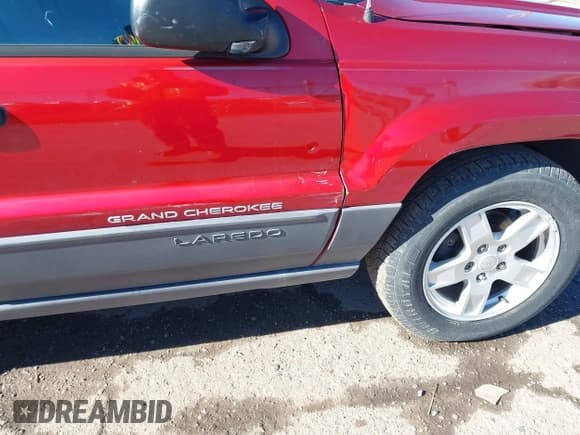 ✅ 2004 Jeep Grand Cherokee Laredo • VIN: 1J4GX48S24C242505 • Lot: 43869706. Listed on IAAI with 195,490 mi. Free auction sales archive from the USA and detailed vehicle history report at DreamBid. Image 12.