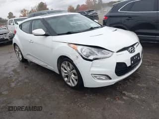 ✅ 2013 Hyundai Veloster w/Black Int • VIN: KMHTC6AD9DU145590 • Lot: 43545139. Wystawiony na IAAI z przebiegiem 155 729 mil. Bezpłatny archiwum sprzedaży aukcyjnych z USA i szczegółowy raport historii pojazdu na DreamBid. Zdjęcie 1.