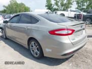 ✅ 2015 Ford Fusion Titanium • VIN: 3FA6P0SU1FR245815 • Lot: 42620841. Wystawiony na IAAI z przebiegiem 172 775 mil. Bezpłatny archiwum sprzedaży aukcyjnych z USA i szczegółowy raport historii pojazdu na DreamBid. Zdjęcie 3.