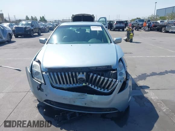 ✅ 2010 Mercury Milan Hybrid • VIN: 3MEDM0L35AR641477 • Lot: 42443628. Listed on IAAI with 102,890 mi. Free auction sales archive from the USA and detailed vehicle history report at DreamBid. Image 13.