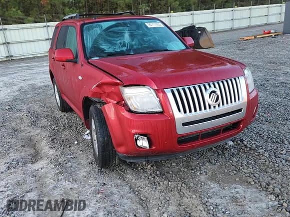 ✅ 2009 Mercury Mariner Premier • VIN: 4M2CU97G09KJ21857 • Лот: 90717455. Опубликован ранее на Copart с пробегом 104 001 миль. Бесплатный доступ к архиву аукционных продаж из США и подробный отчёт об истории автомобиля на DreamBid. Изображение 14.