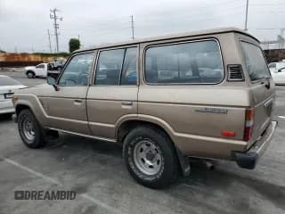 ✅ 1987 Toyota Land Cruiser • VIN: JT3FJ60G4H1136052 • Лот: 68739795. Опубликован ранее на Copart с пробегом 206 230 миль. Бесплатный доступ к архиву аукционных продаж из США и подробный отчёт об истории автомобиля на DreamBid. Изображение 2.