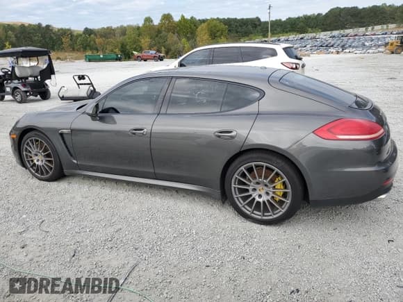 ✅ 2014 Porsche Panamera • VIN: WP0AA2A77EL013410 • Лот: 85870645. Опубликован ранее на Copart с пробегом 125 430 миль. Бесплатный доступ к архиву аукционных продаж из США и подробный отчёт об истории автомобиля на DreamBid. Изображение 2.